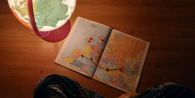 Image of a map and a globe