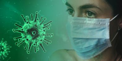 This is an image of a person, wearing a surgical mask, facing a coronavirus.