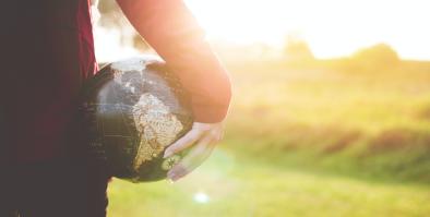 child holding a globe 