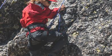 child climbing rock