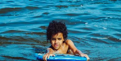 Boy on boogie board